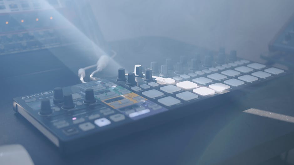 1980s recording studio with vintage synth racks and keyboards, moody lighting