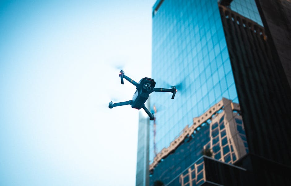 Delivery robot on a city sidewalk near pedestrians and a taco truck, illustrating robots using pedestrian-scale maps