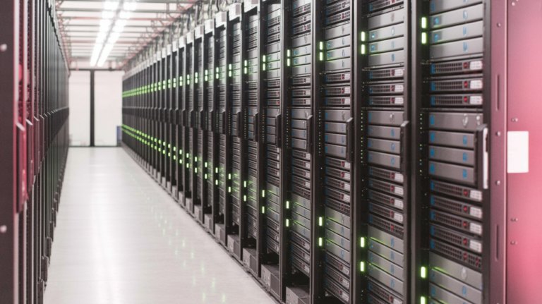 Rows of illuminated server racks in a modern data center