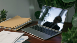 Editorial image of a workplace laptop suggesting enterprise AI privacy and admin oversight