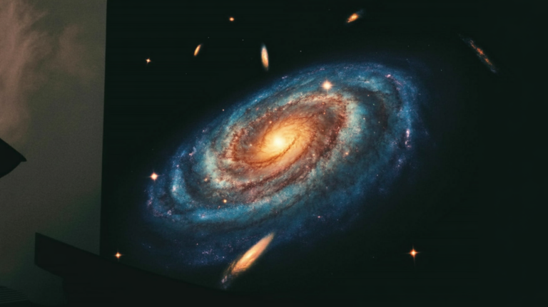 black hole: A young galaxy glowing in the early universe