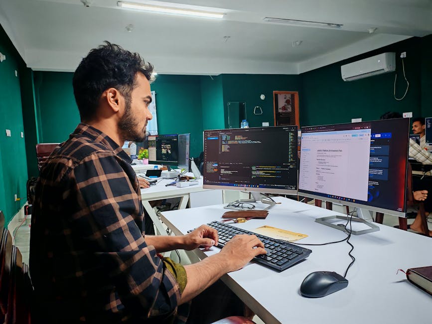 Photo of engineers working in an office