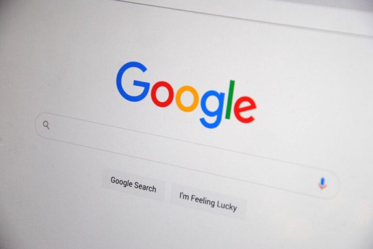 claude shared chats google search: Laptop screen showing the Claude chatbot interface, suggesting searchable shared chat links.