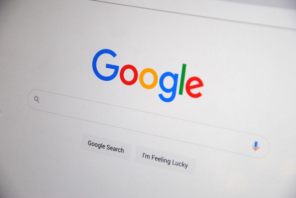 claude shared chats google search: Laptop screen showing the Claude chatbot interface, suggesting searchable shared chat links.