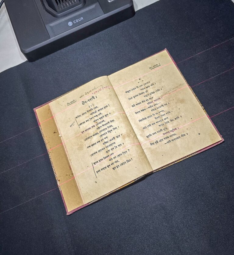 anthropic books scanned for ai training: Used books being scanned in a digitization workflow