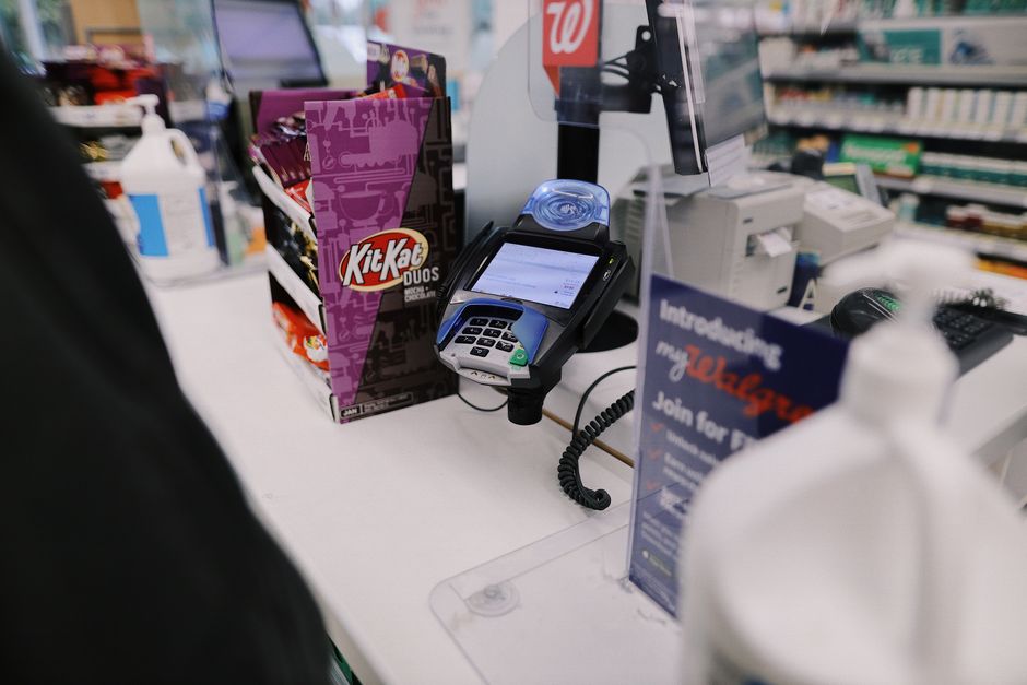 Electronics being purchased at a Target checkout counter.