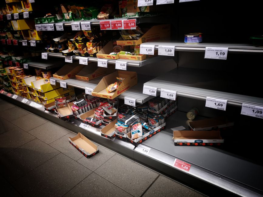 Empty fresh-food shelves in a supermarket