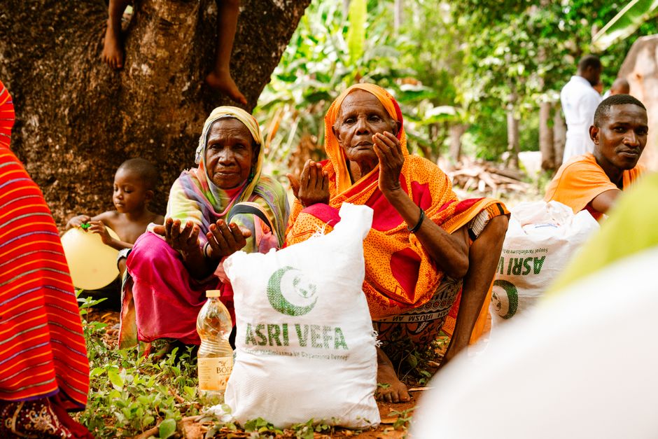 World Food Programme workers distributing food aid to people in need.